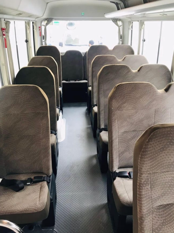 Luxury Bus Passenger Interior – SSM Chauffeurs Luxury bus passenger interior with high-back seats