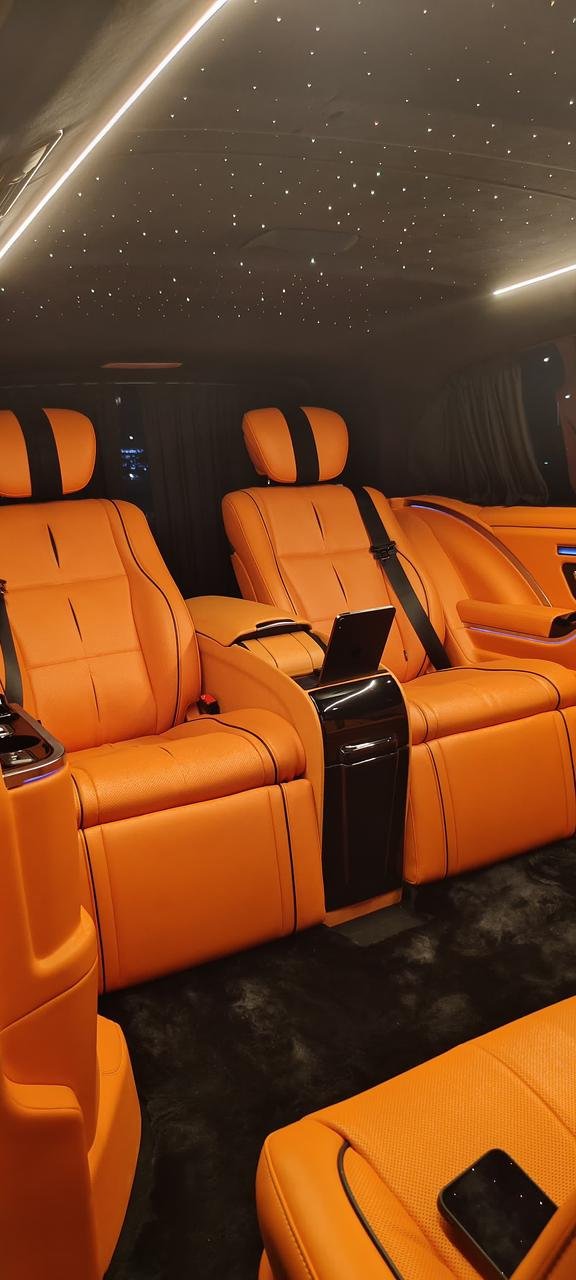 Premium Orange Leather Van Interior – UAE Luxury VIP van seats with orange leather upholstery