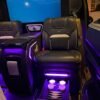 Executive Van Interior – SSM Chauffeurs UAE Luxury van captain seats with purple ambient lighting