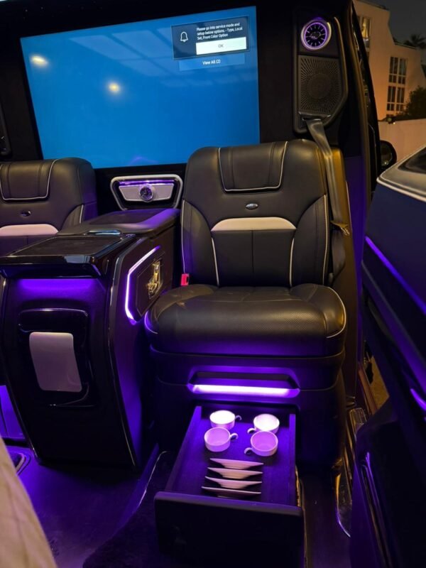Executive Van Interior – SSM Chauffeurs UAE Luxury van captain seats with purple ambient lighting