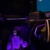 Luxury Chauffeur Van Interior – UAE Luxury van passenger cabin with leather seating and ambient lighting