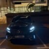 Luxury VIP Van Chauffeur Service – Dubai Black luxury VIP van parked outside at nigh