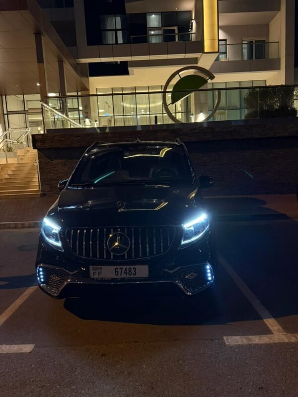 Luxury VIP Van Chauffeur Service – Dubai Black luxury VIP van parked outside at nigh