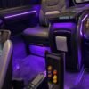 VIP Van Interior with Ambient Lighting – SSM Chauffeurs Luxury VIP van interior with purple ambient lighting and leather seats