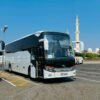 Black Luxury Coach Bus – SSM Chauffeurs UAE Black luxury coach bus exterior in the UAE