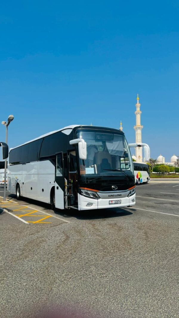 Black Luxury Coach Bus – SSM Chauffeurs UAE Black luxury coach bus exterior in the UAE